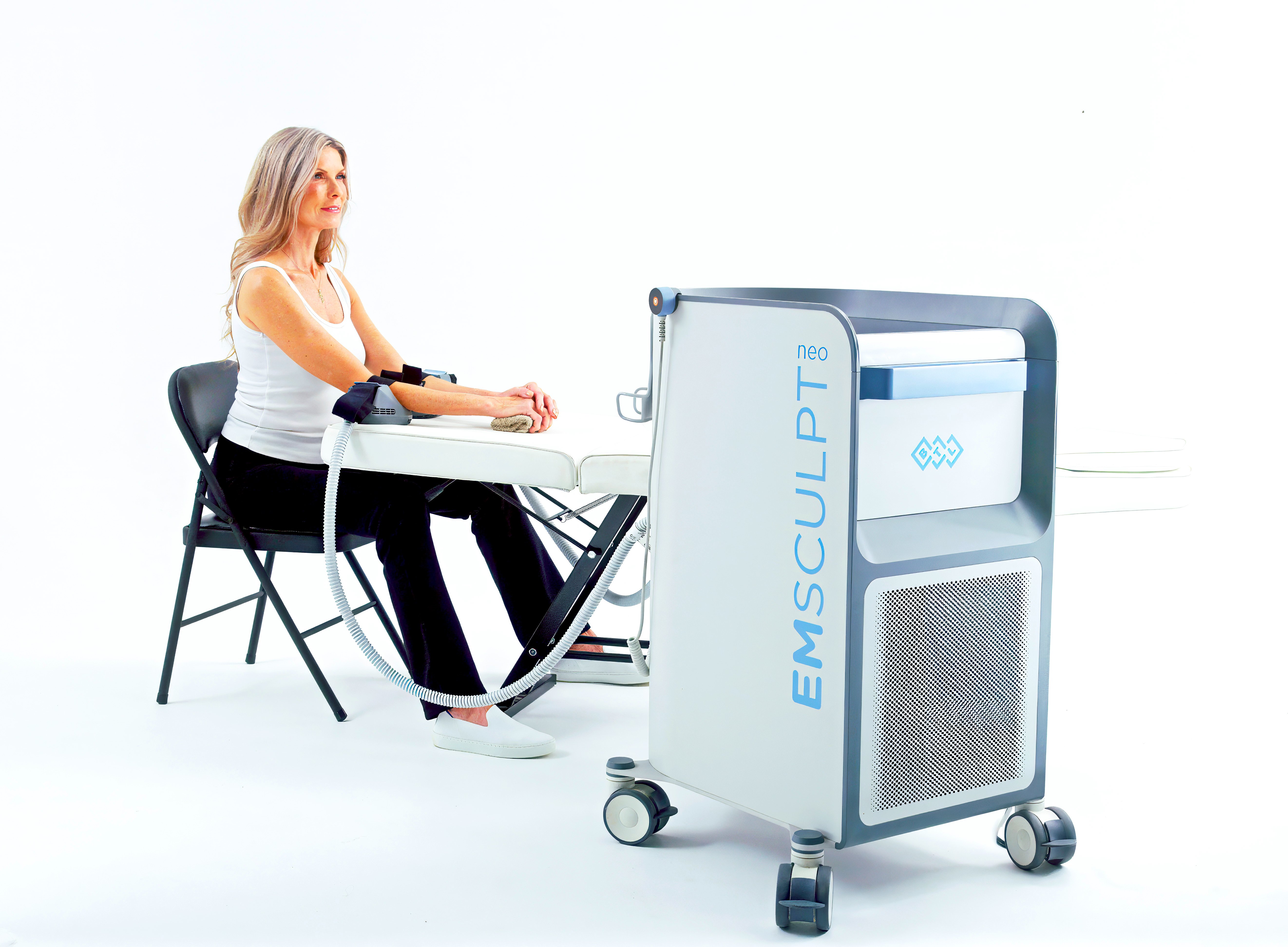 Emsculpt Neo female treatment on arms with small applicator