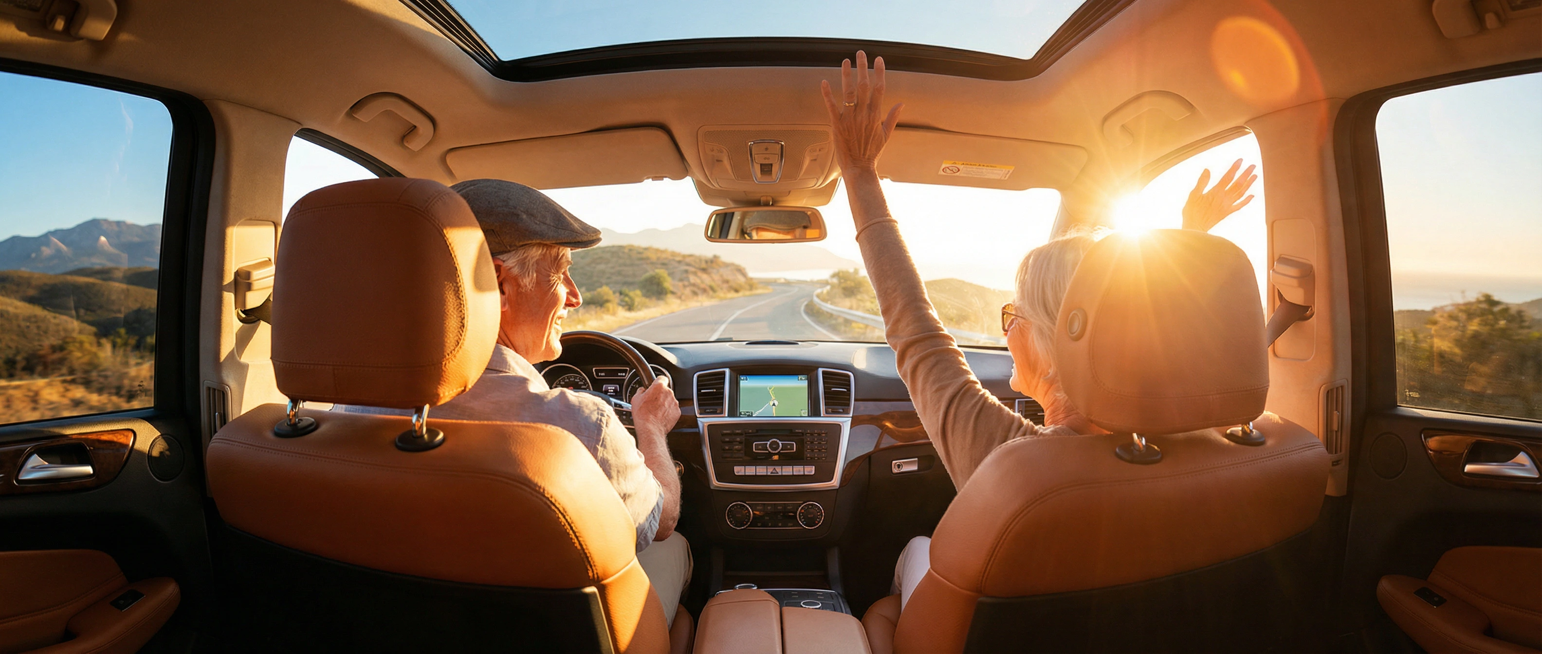 Senior couple enjoying a scenic road trip at sunset, living freely after PRP therapy restored their mobility